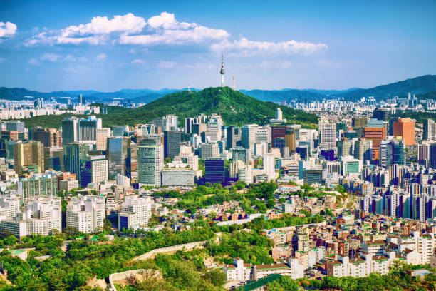 Seoul downtown cityscape with fortress and Namsan Seoul Tower on sunset Seoul, South Korea. Sony aerial view of seoul south korea capital city stock pictures, royalty-free photos & images