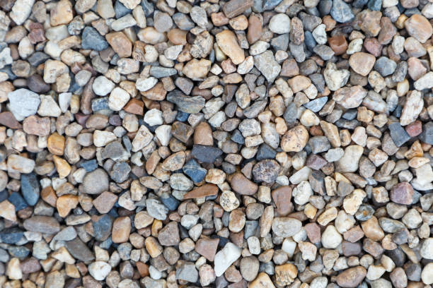 istock Stone pebbles texture or stone pebbles background. stone pebbles for interior exterior decoration and industrial construction concept design. stone pebbles motifs that occurs natural. 950582242