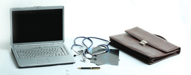 istock closeup. laptop and stethoscope in the workplace therapist 950582546