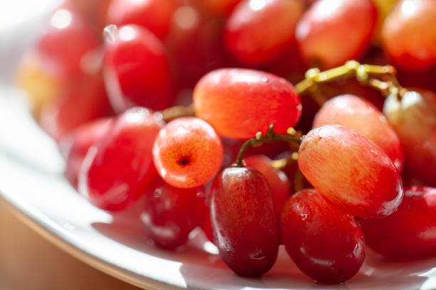 Seedless grapes from the discounter Seedless grapes from the discounter Red Seedless Grapes stock pictures, royalty-free photos & images