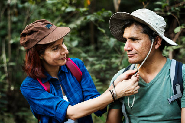 couple trekking together in the forest - 6008 imagens e fotografias de stock