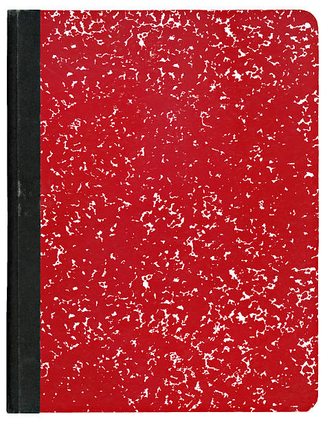 A red marble covered composition book with black binding Red composition notebook isolated on white. composition stock pictures, royalty-free photos & images