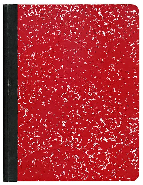 Photo of A red marble covered composition book with black binding