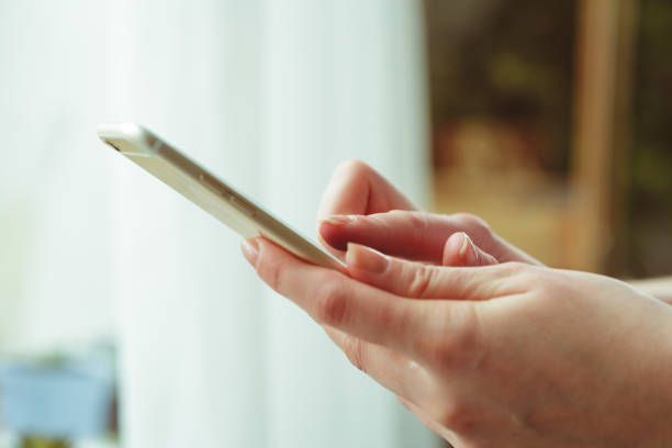 istock Woman typing write message on smart phone 950593022