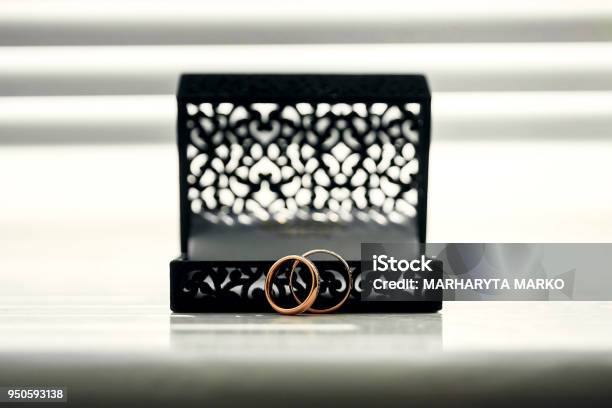 Gold Wedding Rings And A Black Lace Box Stock Photo - Download Image Now - Anniversary, Art, Beauty