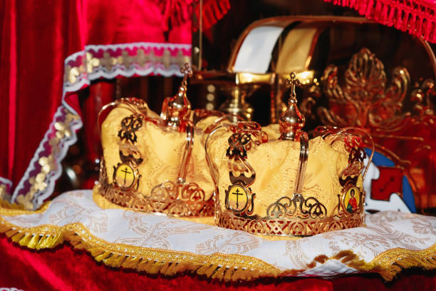 istock two wedding crowns in the church 950593630