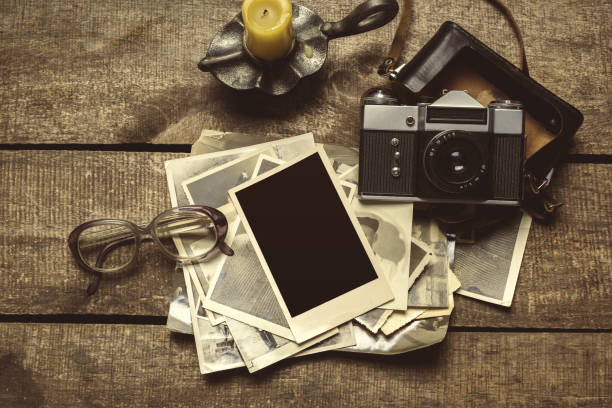 istock old photos on the wooden table 950594150
