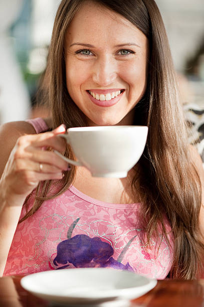 istock pretty woman with cup of tea 95059508