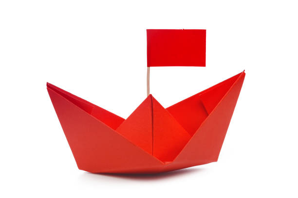istock origami paper boat isolated on white background 950597140