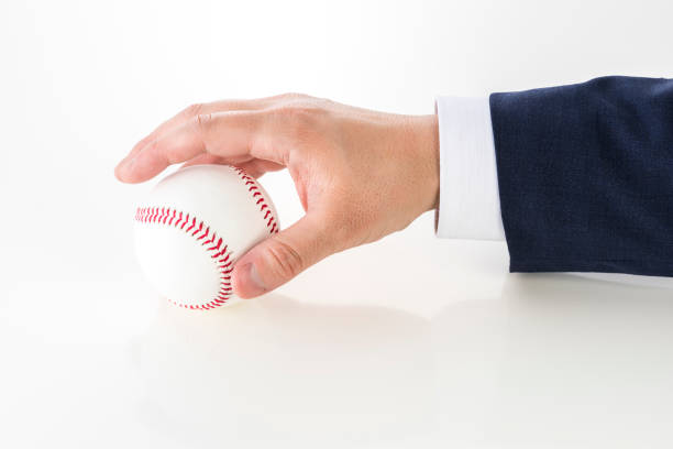 istock Male hand holding a baseball 950597896