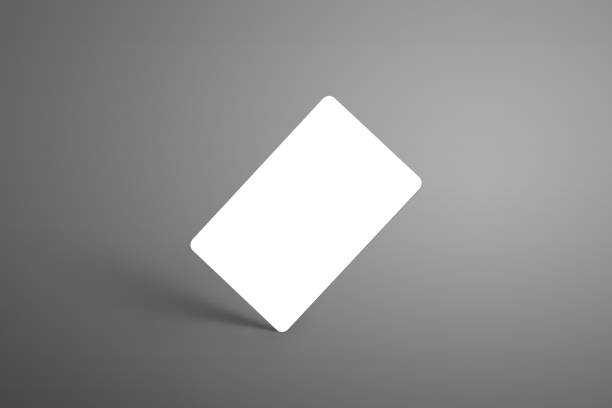 istock Universal mockup one bank (gift) card on a gray background standing on the corner with shadows. 950603432