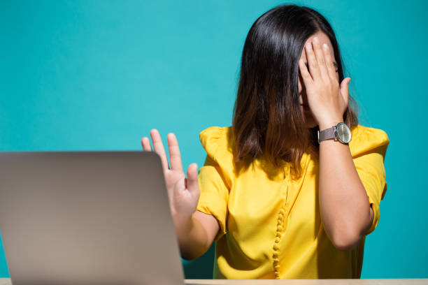 istock Woman has shock when she look at laptop 950604010