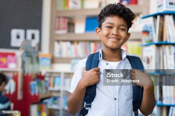 Smiling Hispanic Boy At School Stock Photo - Download Image Now - Child, Boys, Backpack