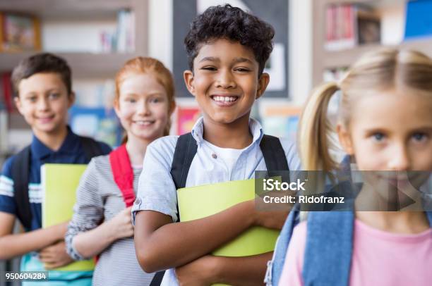 School Children Standing In A Row Stock Photo - Download Image Now - Child, Education, Back to School