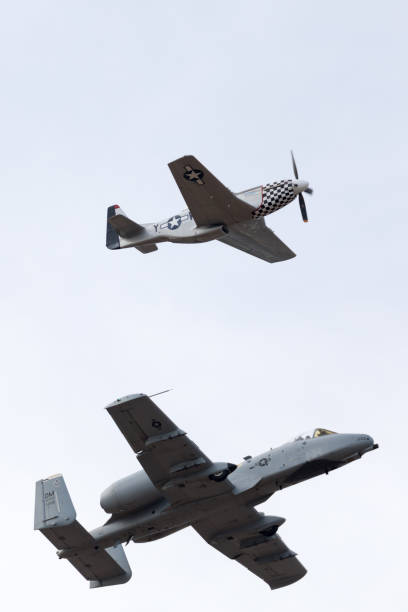 Thunder Over Louisville 2018 Louisville, Kentucky, USA - April 21, 2018 A-10 Thunderbolt and a P-51 Mustang in formation at the Thunder Over Louisville a10 warthog stock pictures, royalty-free photos & images
