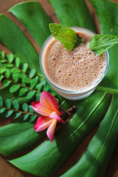 istock Healthy Smoothie on wood table 950608078
