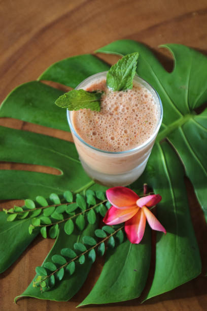 istock Healthy Smoothie on wood table 950608458