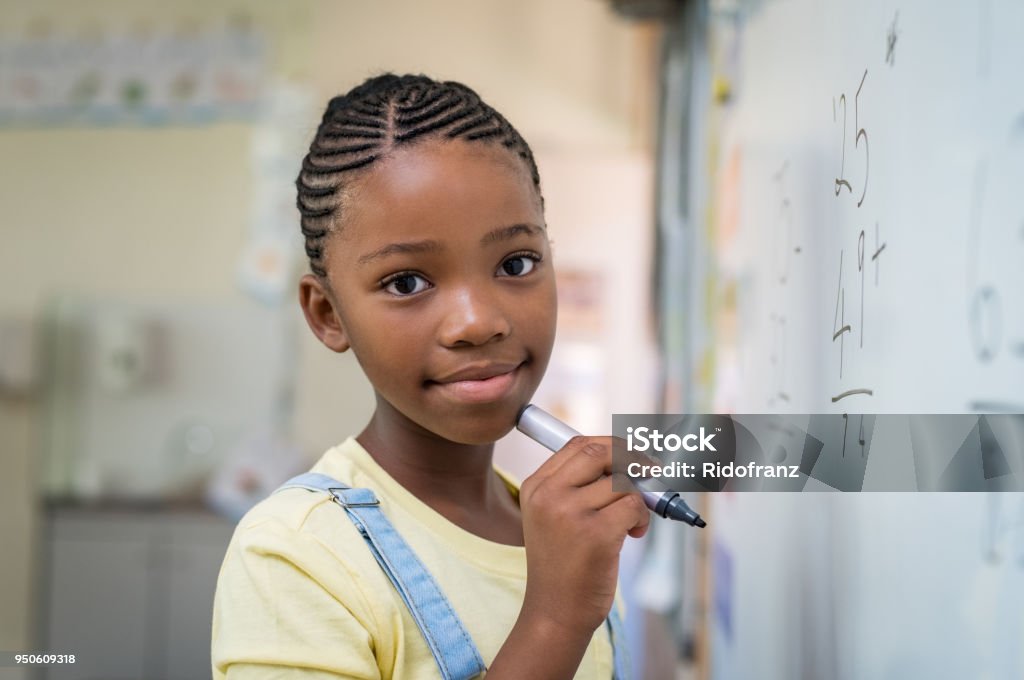 Withboard Math Girl Girl Doing Math At Whiteboard Stock Photo - Download Image Now - Girls ...