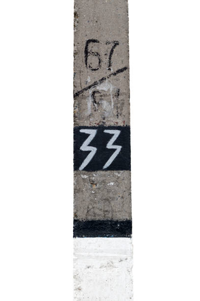 istock Cement column with the inscription white paint thirty three. 950612894