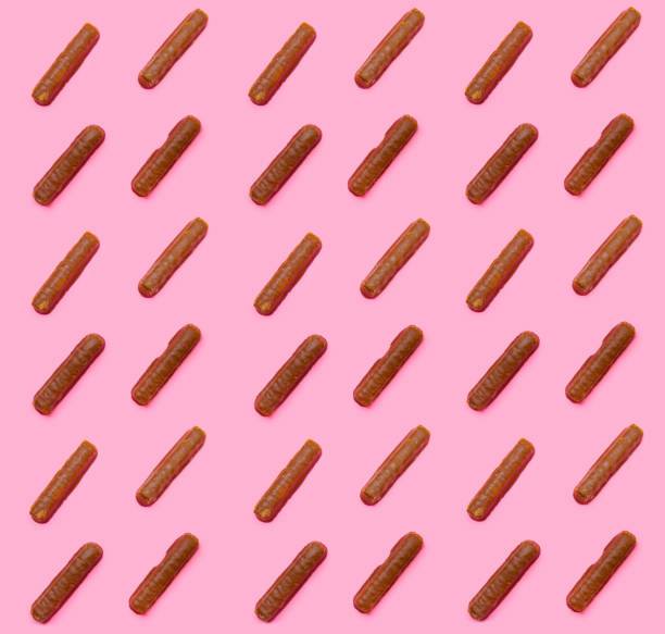 istock Cookies pattern on the pink background 950613126