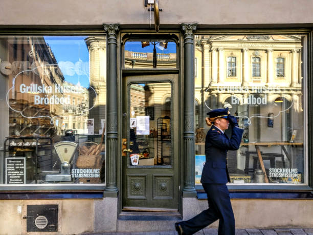 STOCKHOLM, SWEDEN Bakery and Swedish officer on Stortorget on Gamla Stan