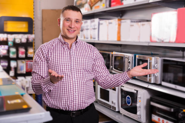 istock Middle-class  man  in appliances store 950615058