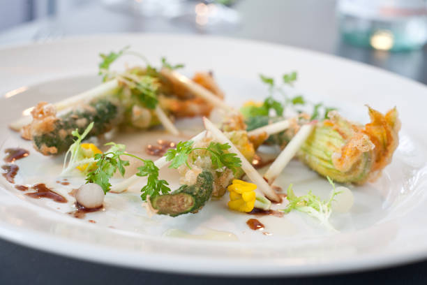 istock Vegetarian dish of fried Zucchini flowers 950615788