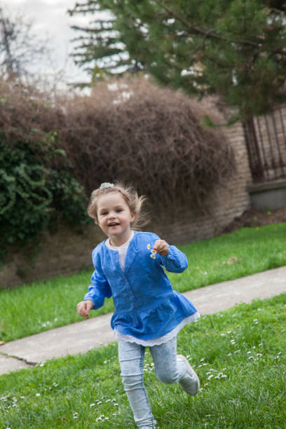 istock Girl running at the park 950622574