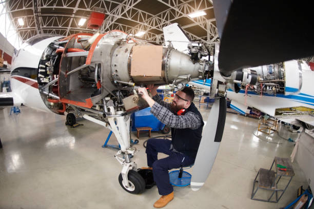 istock Aircraft mechanic in the hangar 950623410