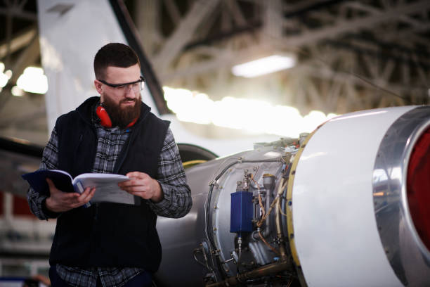istock Aircraft mechanic in the hangar 950623700