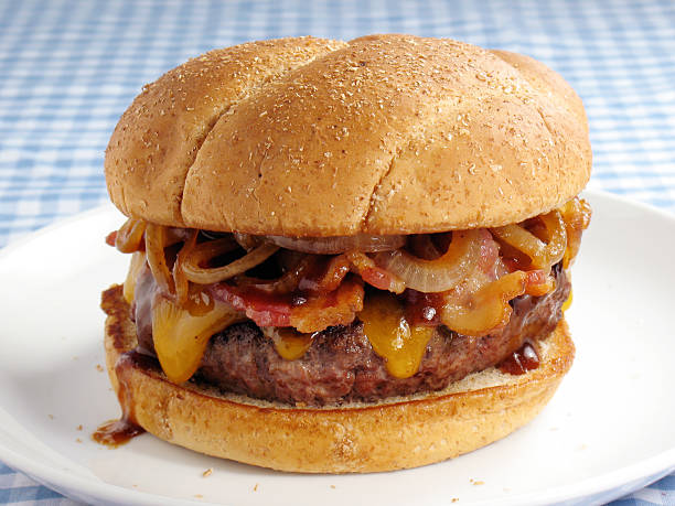 Messy Bacon Cheeseburger  bacon cheeseburger stock pictures, royalty-free photos & images