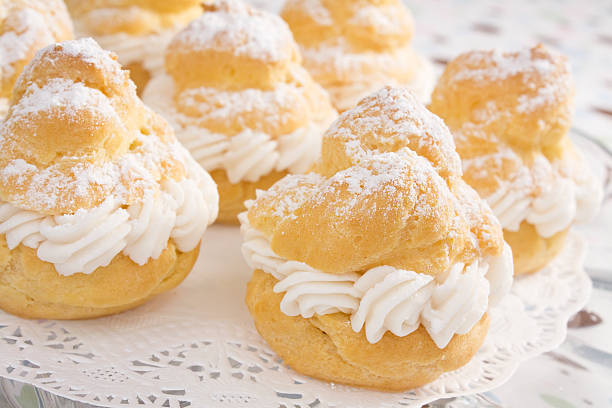 Powdered Cream Puffs  choux pastry photos stock pictures, royalty-free photos & images