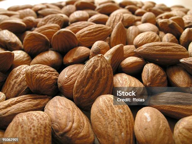 Almonds Stock Photo - Download Image Now - Almond, Backgrounds, Brown