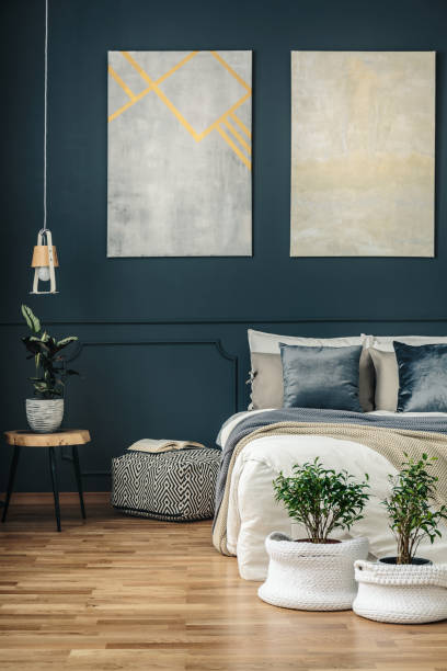 istock Navy blue bedroom with art 950629432