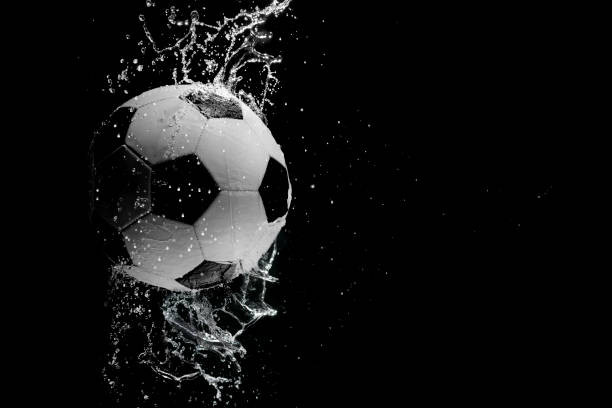 istock Soccer ball on the black background. 950629492
