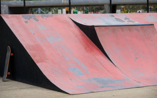 istock Skateboard leaning on skatepark ramp 950629682