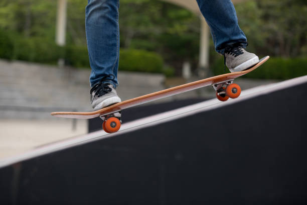 istock Skateboarder sakteboarding on skatepark ramp 950633426