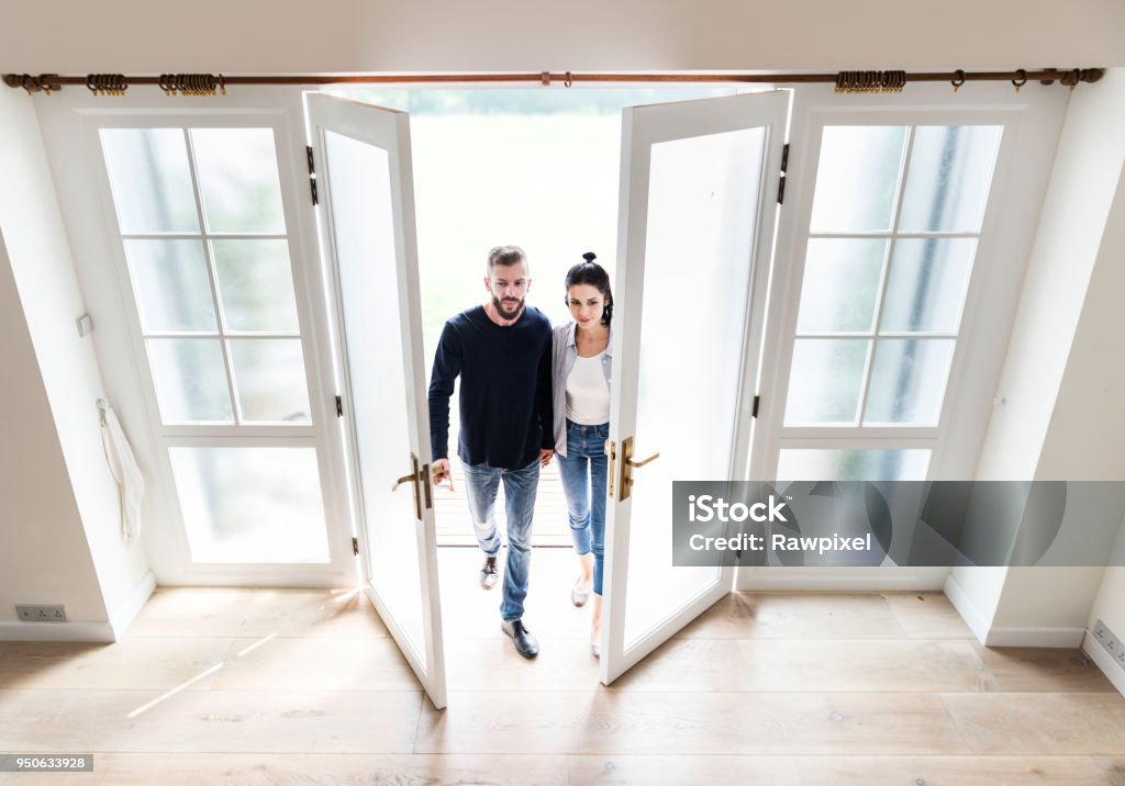 Couple move to new house Home Ownership Stock Photo