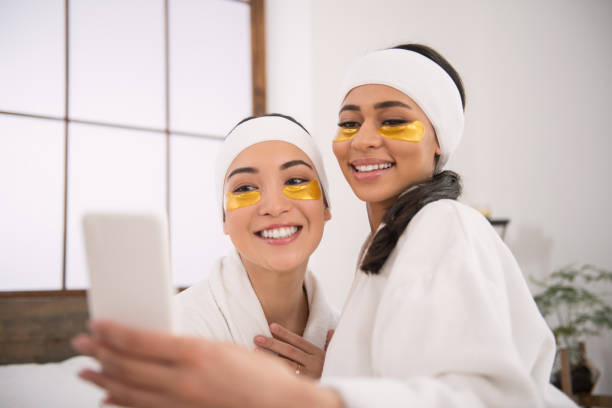 Delighted happy women taking a photo