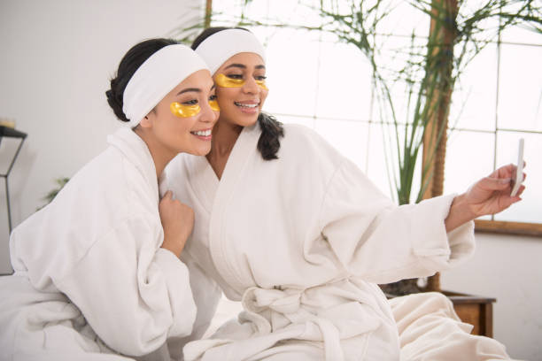 istock Happy delighted women smiling 950634108