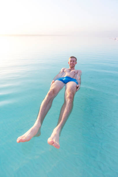 istock Tourist swims in Dead Sea. Jordan 950637672