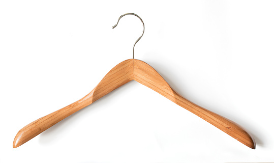 Clothes hanger isolated on white background. Wooden hanger