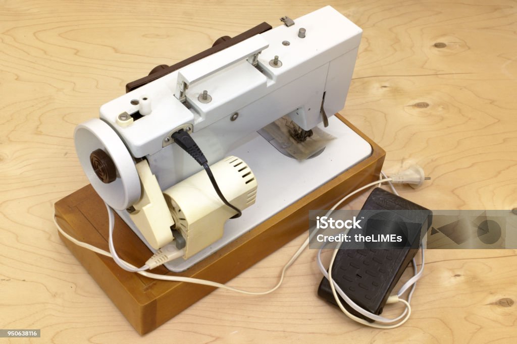 Electric Sewing Machine Heavy Duty With Side Electric Motor And Foot  Controller Black Pedal Set On A Wooden Platform Stock Photo - Download  Image Now - iStock