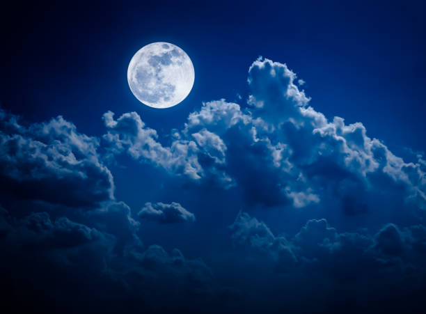 istock Night sky with bright full moon and cloudy, serenity nature background. 950638756