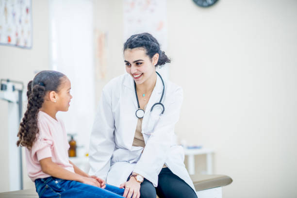 istock Doctor Talking With A Young Patient 950644856
