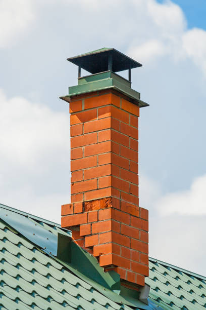 istock Red brick chimney pipe at home 950646126