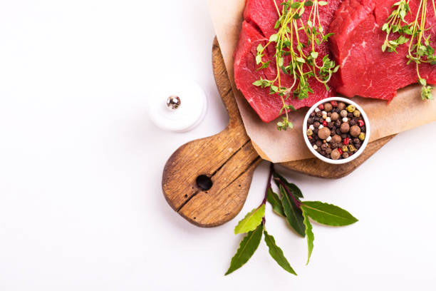 istock Fresh raw beef tenderloin and marbled steaks with seasoning 950646770