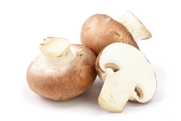 istock Royal Brown champignon with half isolated on white background 950646886