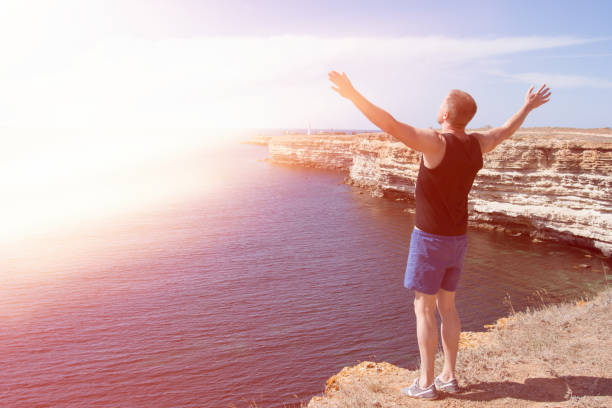 istock Freedom. Enjoying life. A happy man. 950652782