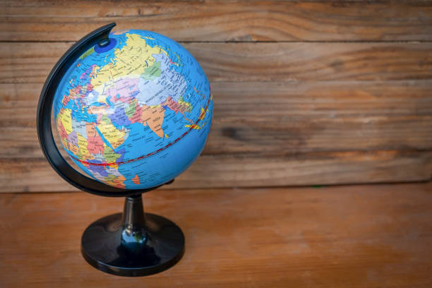 istock planet ball on wood table and background 950656190
